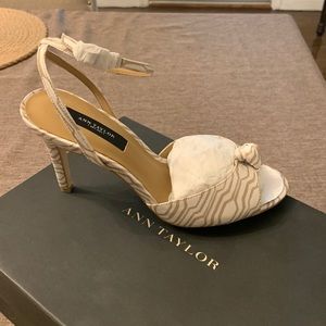New in box, Ann Taylor Gemma Peep Sling Heels. Size 7. Warm sesame color.